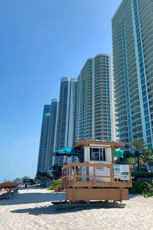 Beachfront residential towers near the beach in Miami, Florida.