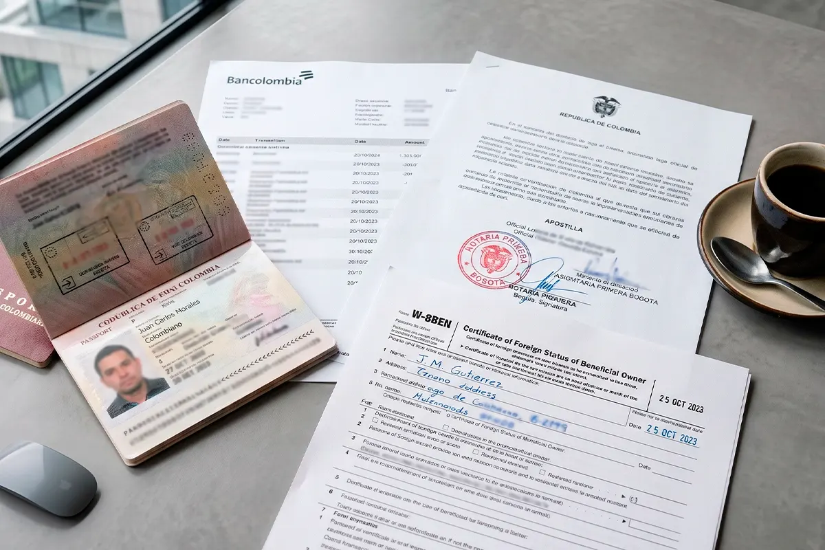 Colombian passport, bank statements, and W-8BEN form for a Florida foreign national loan.